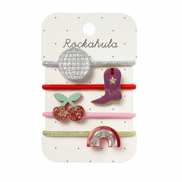 Set of colorful hair accessories on a Rockahula branded card